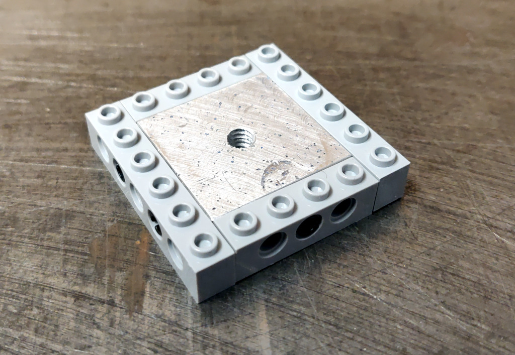 aluminum-adapter-with-brick-wall.jpg